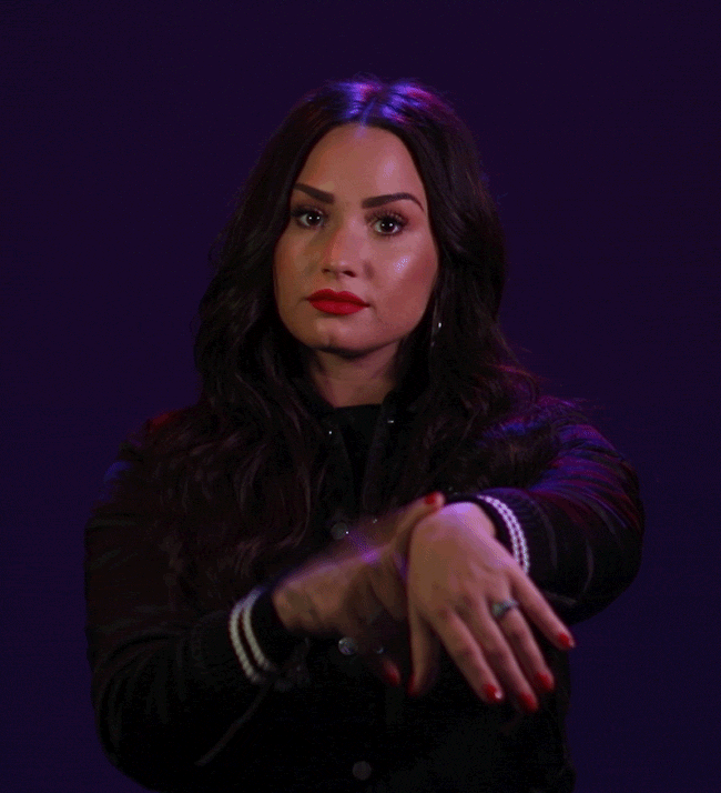 Were Waiting Demi Lovato Pointing At Wrist Watch GIF