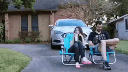 Were Waiting Man And Woman In The Driveway GIF