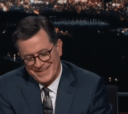 Were Waiting Stephen Colbert Tapping His Watch GIF