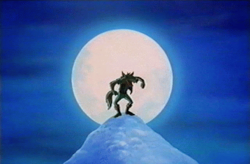 Werewolf On Snowy Mountain Under Full Moon GIF