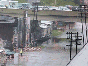 Wet Road Passing Train GIF