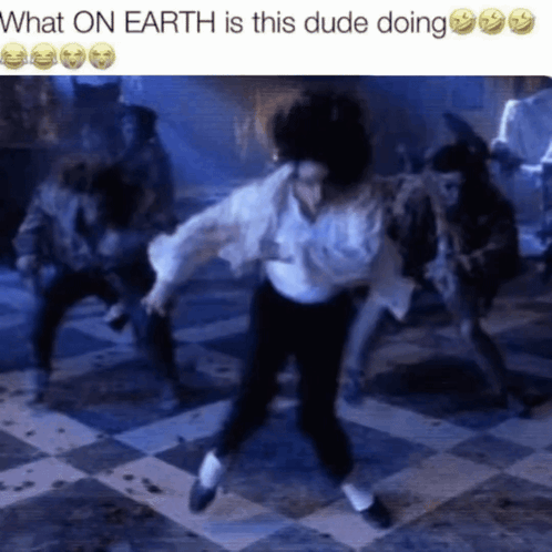 What On Earth Is This Dude Doing With A Picture Of A Man Dancing GIF