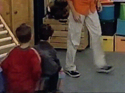What's In The Box Boy Carrying Colorful Box GIF
