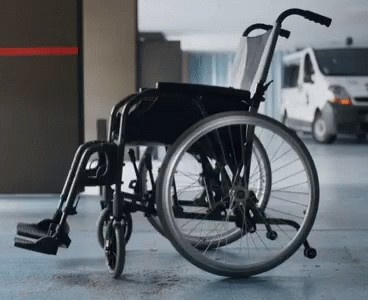 Creepy Wheelchair Turning GIF