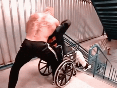 Brock Lesnar Pushed Wheelchair GIF