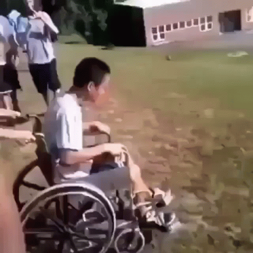 Kid Wheelchair Down Hill GIF