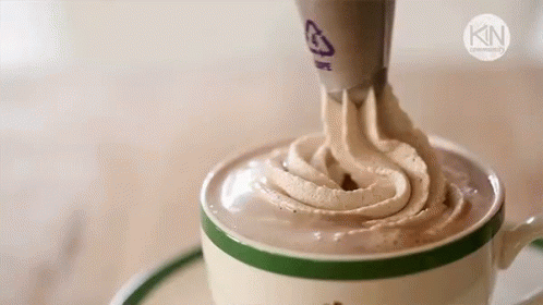 Whipped Cream Poured Into Coffee With Kin Logo GIF
