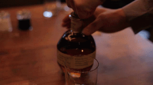 Whiskey Poured Into Glass GIF