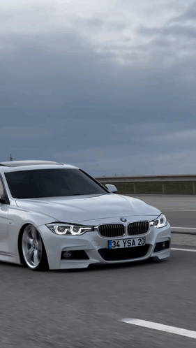 White BMW With License Plate 34 YSA 20