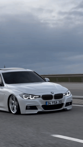 White BMW With License Plate 34ysa 20