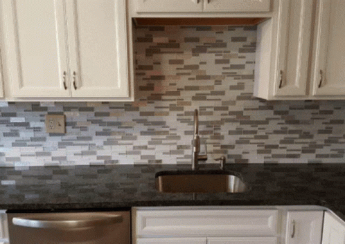 White Cabinets Kitchen with Black Countertop