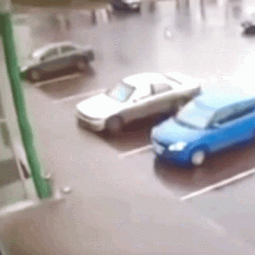 White Car and Blue Car Parked