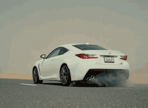 White Car Parked on Desert Road