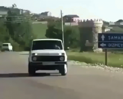 White Car Turn Around GIF