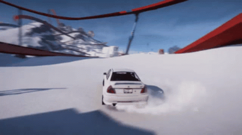 White Car with California License Plate in Snow