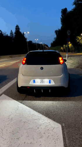 White Car With License Plate DK 098 F GIF
