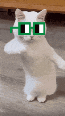 White Cat Wearing Green Glasses