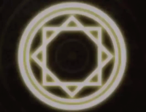White Circle With Glowing Star on Black Background