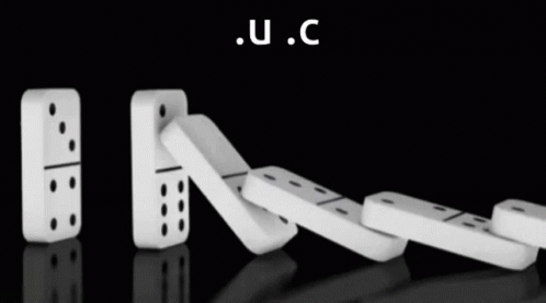 White Dominoes On A Black Background With The Letters U.c. Visible GIF