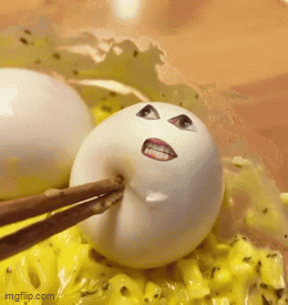 White Egg Face Picked Up by Chopsticks