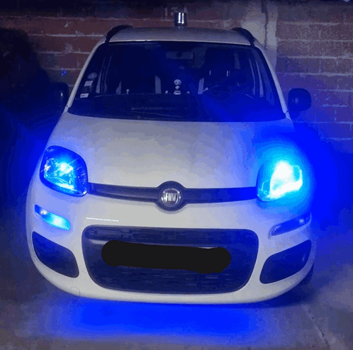 White Fiat Car With Blue Lights GIF
