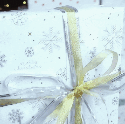 White Gift Saying Merry Christmas GIF