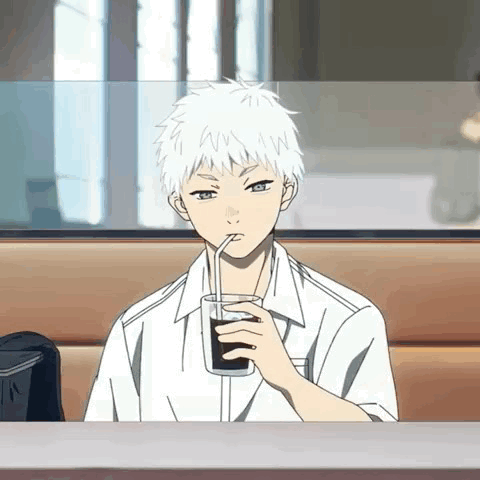 White-Haired Boy Drinking Through Straw