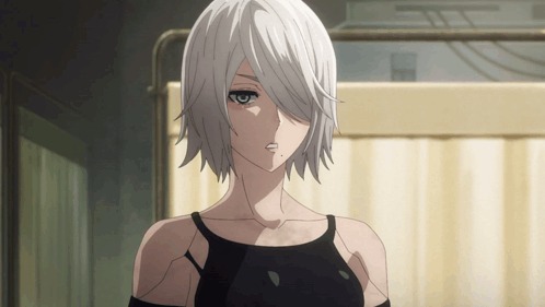 White-Haired Girl in Black Top Looking at Camera