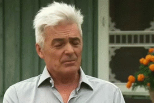 White Haired Man on Screened Porch