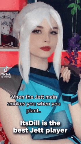 White-Haired Woman in Blue Shirt and Gloves