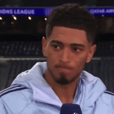 White Jacket Man Talking Into Microphone Sports League GIF