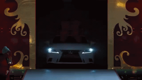 White Lexus With Red Bow