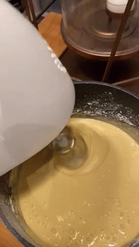 White Mixer Mixing Yellow Liquid