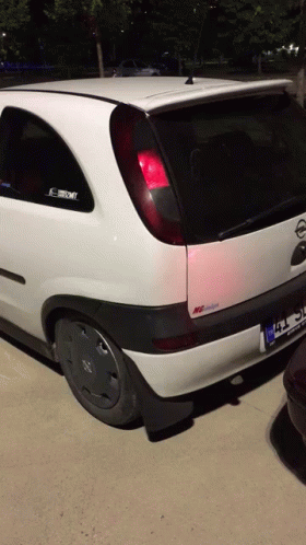 White Opel Car With TC License Plate GIF