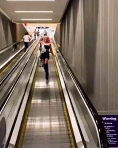 White People Escalator Falling Fail GIF