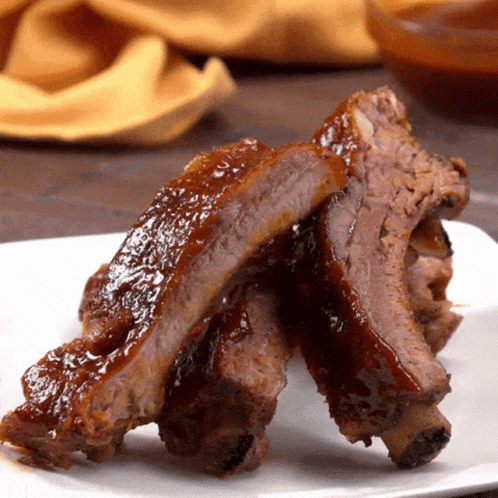 White Plate With Ribs and Sauce