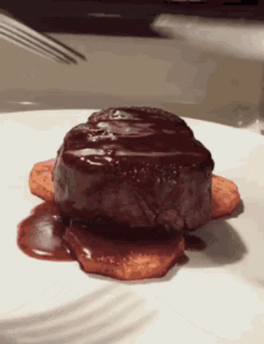 White Plate With Steak And Sauce GIF