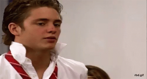 White Shirt Red Tie Man Looking At Camera GIF
