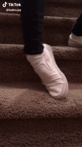 White Shoes Walking Down Stairs TikTok Watermark