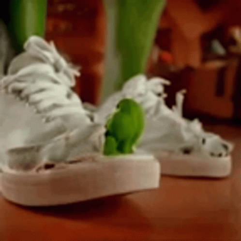 White Sneakers With Green Frog GIF