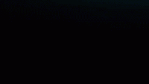 White Spider Logo On Black Background GIF