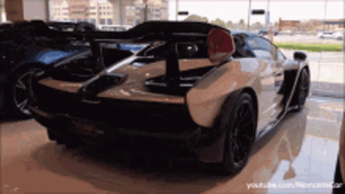 White Sports Car in Showroom