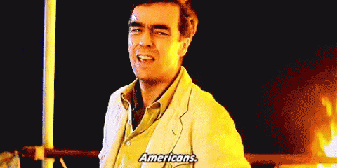 White Suit Man Talking About Americans