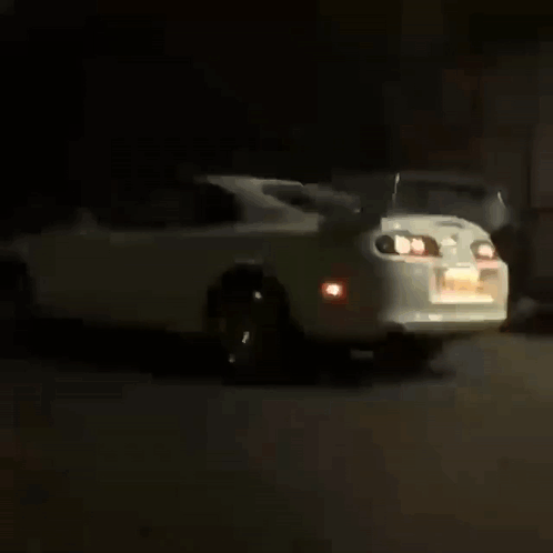 White Toyota Supra Flaming Muffler GIF