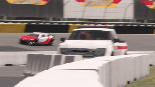 White Truck Driving on Race Track