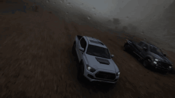White Truck Flying Over Hill GIF