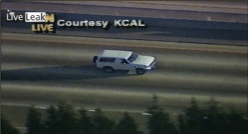 White Van Driving on Highway