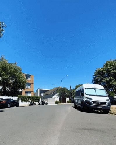 White Van Parked With ECW License Plate GIF