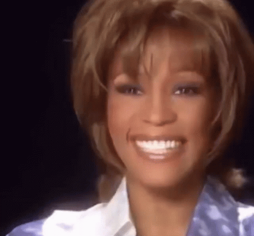 Whitney Houston Joyful Laughter Captured GIF