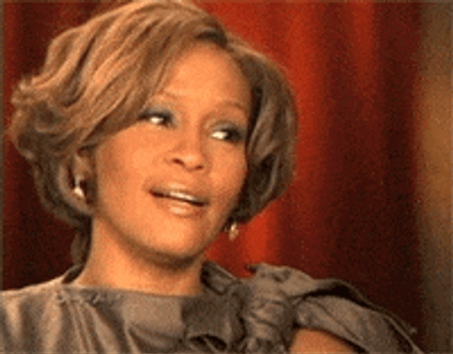 Whitney Houston Not Funny Shifting Facial Reaction GIF